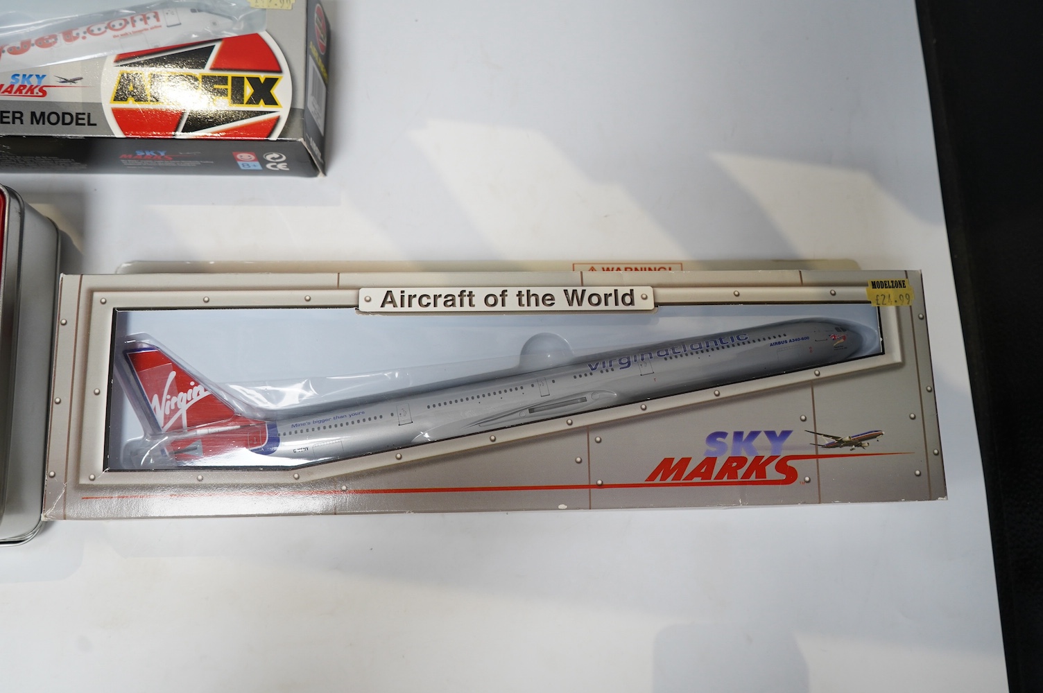 Forty-four boxed models of modern passenger aircraft by Gemini Jets, Airfix, Sky Marks, etc. in a variety of scales including 1:400, 1:200, etc. operators include British Airways, Vietnam Airlines, Virgin Atlantic, etc.